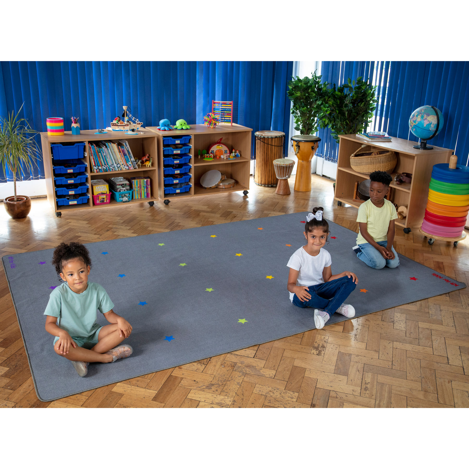 Essentials Rainbow Stars Carpet | theClassroom.co